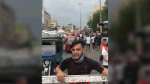 Motorized rickshaws, also known as tuk-tuks, race through the streets of Baghdad during anti-government protests on Oct. 25. (Mustafa Salim/The Washington Post)